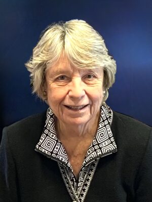 smiling woman with light colored hair